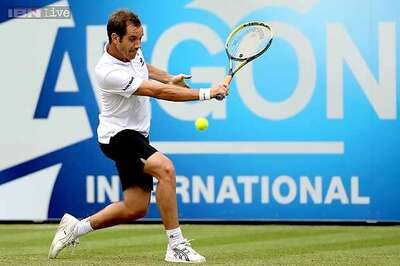 Gasquet enjoys birthday win over Tomic on grass