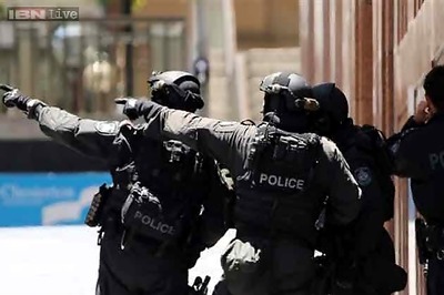 Australia: Three hostages escape from Sydney cafe, police in touch with armed gunman