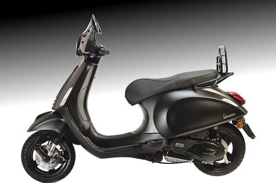 Collectors' Model Matte-Black Vespa Primavera 125 on Display at Colette Store in Paris
