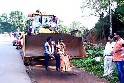 Karnataka Groom Takes his Bride Home Riding a JCB Earthmover