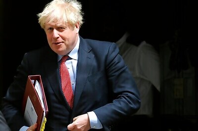 UK's Johnson preps for new COVID wave but eyes more opening