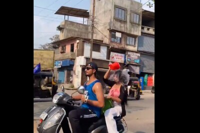 Duo Takes Bath While Riding Scooter – And We Have Seen Everything