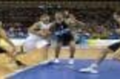 Argentina sinks while Spain soars in hoop openers