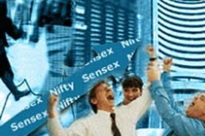 Sensex closes above 13,600
