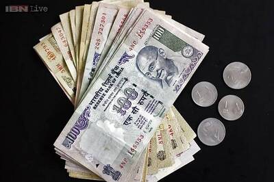 US dollar ended lower against the rupee at 62.36 per dollar