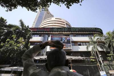 Sensex tanks 418 points on global growth woes; Nifty below 7,400