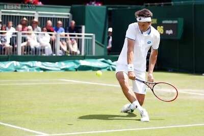 Stakhovsky beats Gulbis to enter third round at Wimbledon