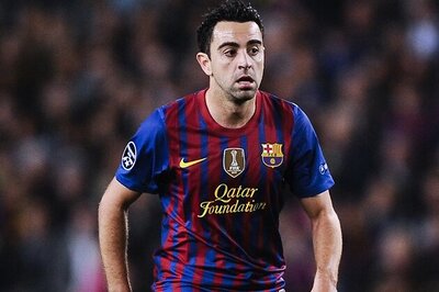 Barcelona playmaker Xavi returns to training