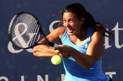 Bartoli struggles through to Stanford quarters