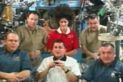 Space tourist docks at space station