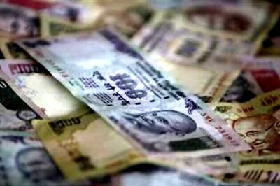 Rupee jumps 85 paise, Sensex rises 219 points after PM's hard-talk