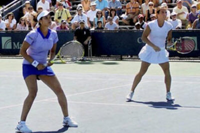 Sania out of doubles, Bhupathi advances in mixed doubles