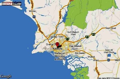 Thousands rally in Pakistan's Karachi as party chief held