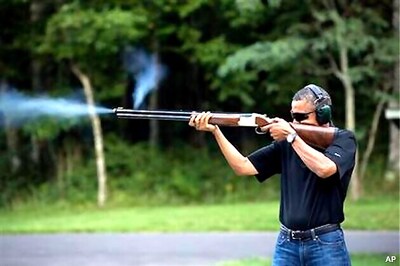 White House releases photo of Obama firing gun