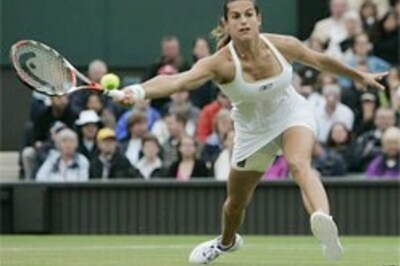 Mauresmo, Sharapova shine amid rains