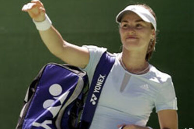 Clijsters to meet Sharapova in semis