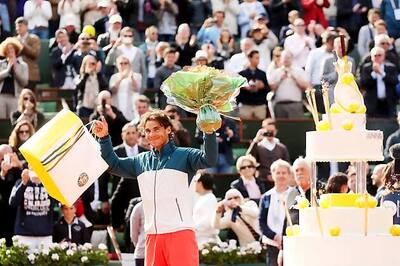 Birthday boy Rafael Nadal reaches last eight at Roland Garros