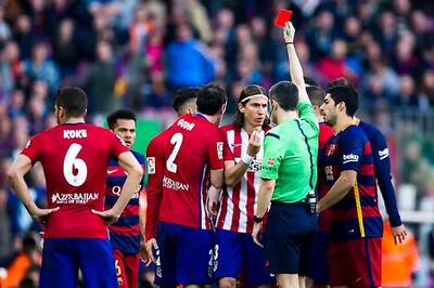 Atletico Madrid's Filipe Luis ban reduced to one game