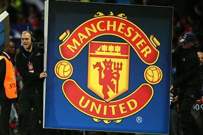 Manchester United raise full-year profit forecast
