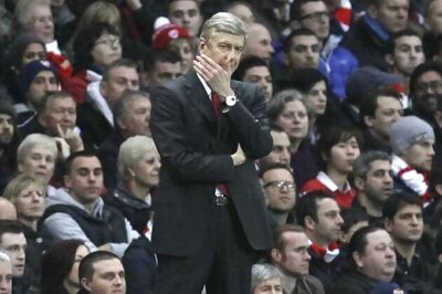 Embattled Wenger backs Arsenal to fight back