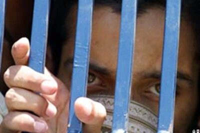 Two bomb blasts in Pakistan kill 34 people