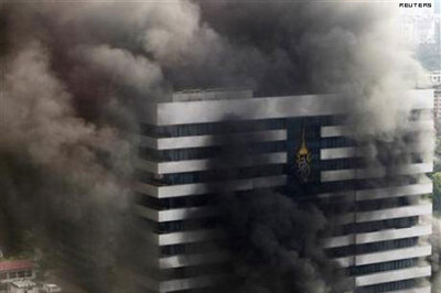 Thai army storms into protest zone, three die