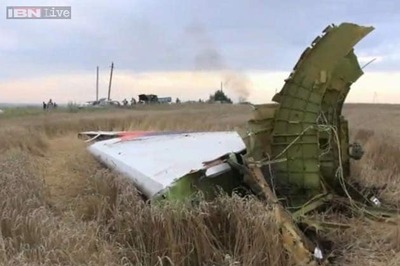 Ukraine rebels take away most of the downed Malaysian plane recorders
