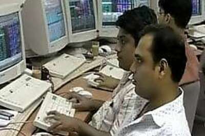 Markets end flat; IT, auto, banks slip