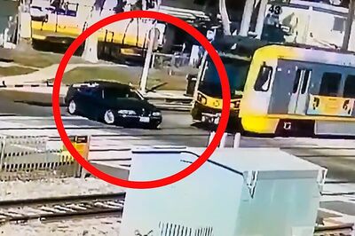 WATCH: Freak BMW Accident With High-Speed Train Goes Viral as Driver Walks Away Alive