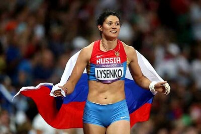 Olympics: Lysenko sets record to win hammer gold