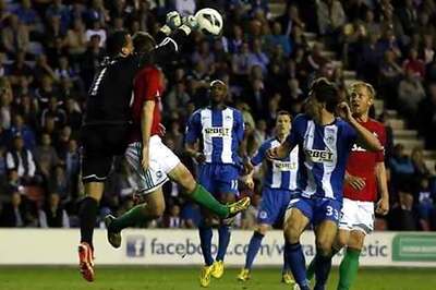 Wigan on brink of drop after defeat to Swansea