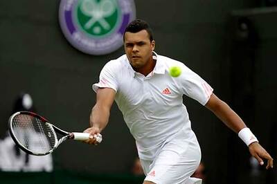 Tsonga cruises past Hewitt at Wimbledon