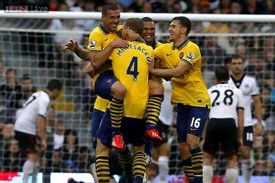 Podolski scores a brace  as Arsenal beat Fulham 3-1