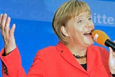 Merkel wins, aims for quick coalition deal with FDP