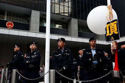 Gasoline Bombs Set Off Near Two Hong Kong Police Stations, Suspect Arrested