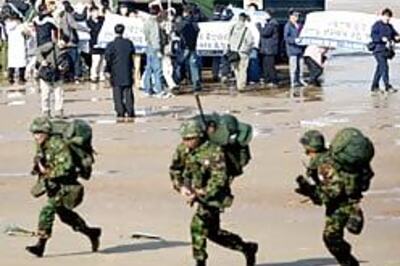 US troops charged with killing Iraqi