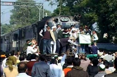 UP sugarcane farmers protest against mills and unpaid dues