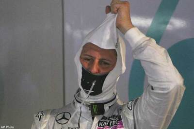 Schumacher penalised for overtaking Alonso