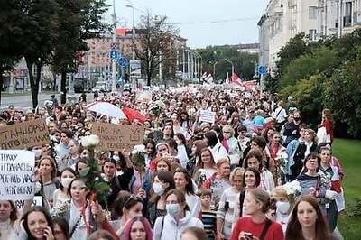 Women March Through Belarusian Capital Calling For Lukashenko To Step Down