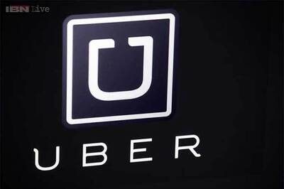 Uber driver arrested for 'misbehaving' with woman passenger