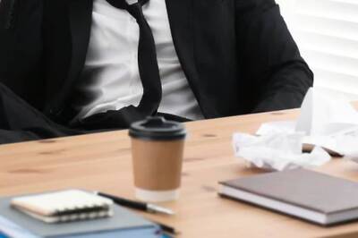 What Is Coffee Badging? The New Workplace Trend Everyone Is Talking About