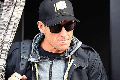 Lance Armstrong reaches settlement with Sunday Times