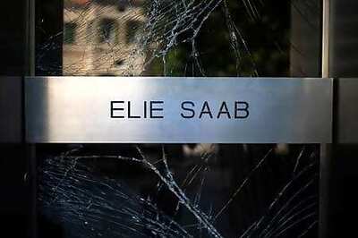 'We must go on,' says Lebanese designer Elie Saab after blast