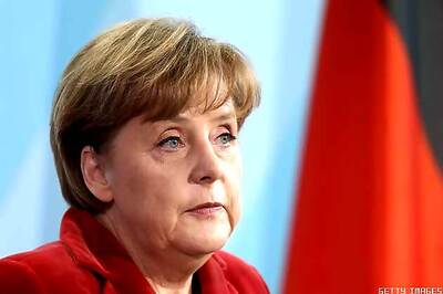 Germany: Angela Merkel begins third term as chancellor