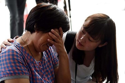 Families of 12 passengers on flight MH370 file lawsuits