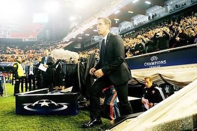 Gary Neville suffers as Valencia crash out of Champions League