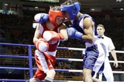 Boxer Jitender loses in 51kg quarters, misses bronze