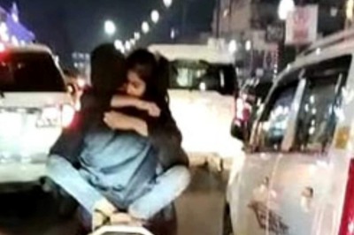 On Cam | Youngsters Seen Hugging on Moving Scooty in Lucknow's Hazratganj, UP Police Probe Underway