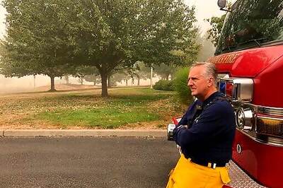 Firefighters Battle Exhaustion Along With Wildfire Flames