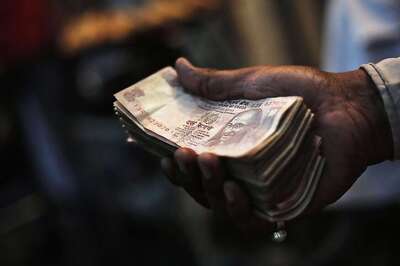 Rupee Sheds 12 Paise Against US Dollar